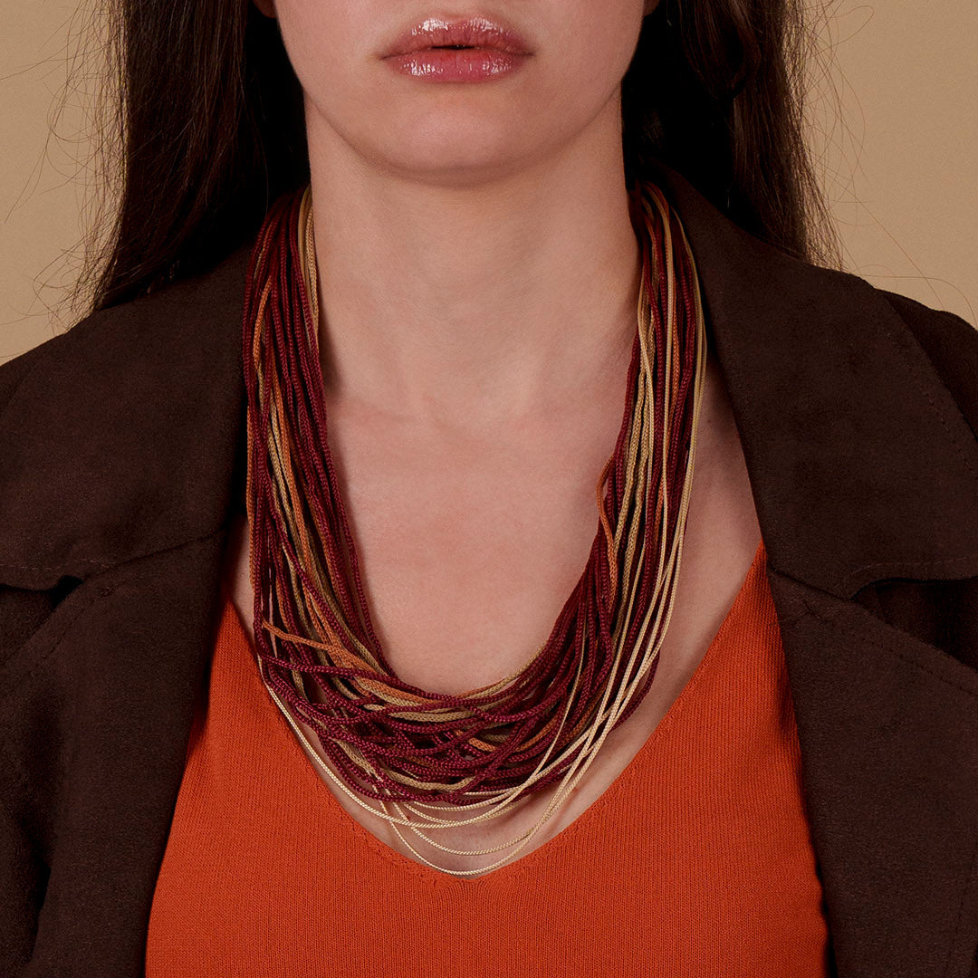 collana-fili2-bourdeaux-e-oro-carlotta-scarabeo