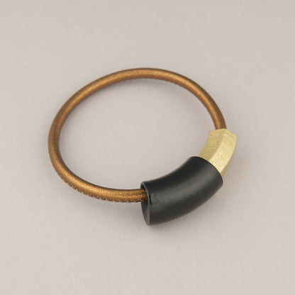 Bracciale Tube - Nero e Dorato